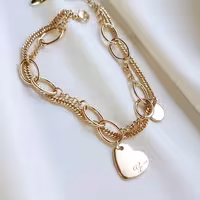 دستبند چندلاین آویز دار طرح طلا.کد 250270375.جنس ژوپینگ آبکاری آبطلا.رنگ ثابت ضدحساسیت