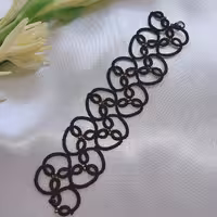 دستبند مشکی با منجوق طلایی 