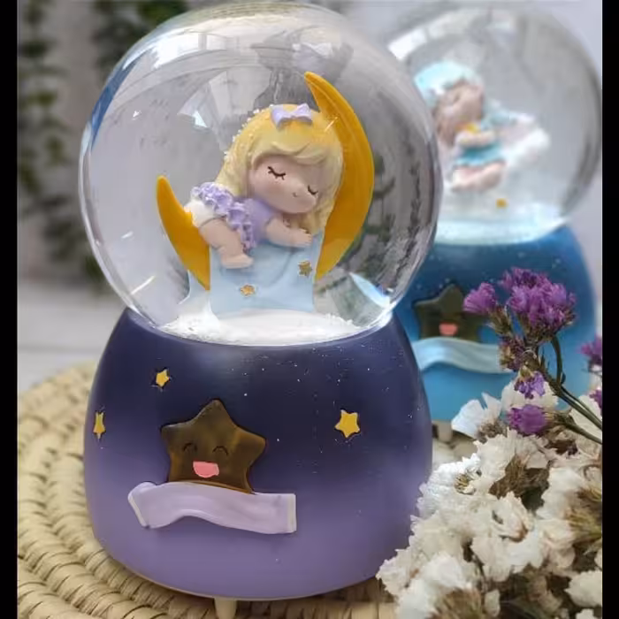 گوی پمپی موزیکال بچگانه دارای دو LED و ستاره شفاف 