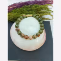 دستبند سنگی اوناکیت با گوی سوراسکی رزگلد و بافت کشویی