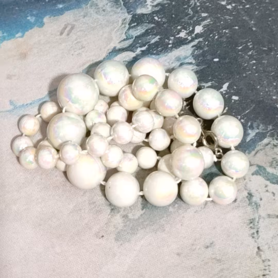 گردنبند و دستبند مروارید هفت رنگ