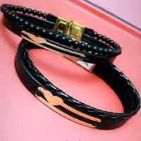 دستبندچرم و طلا..چرم طبیعی دولایه ‌رنگ لبه حرفه ای ..طول 18الی23