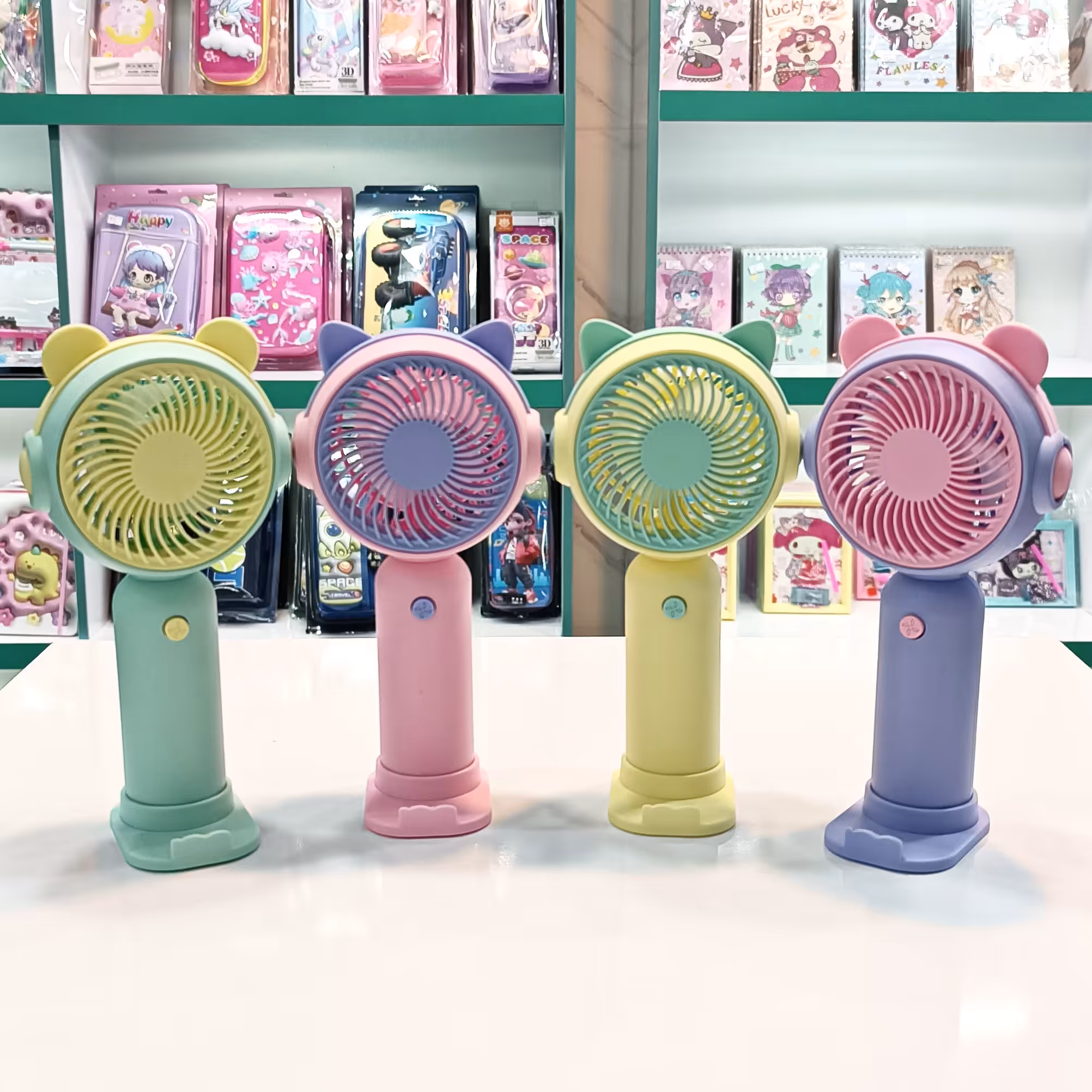 پنکه دستی پایه دار باطری خور - مینی پنکه - پنکه مسافرتی - فن دستی - مینی فن - پنکه رومیزی - پنکه باطری خور دستی  