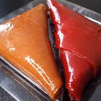 سمبوسه لواشکی شکم پر قوطه ور در سس ترش 600 گرمی