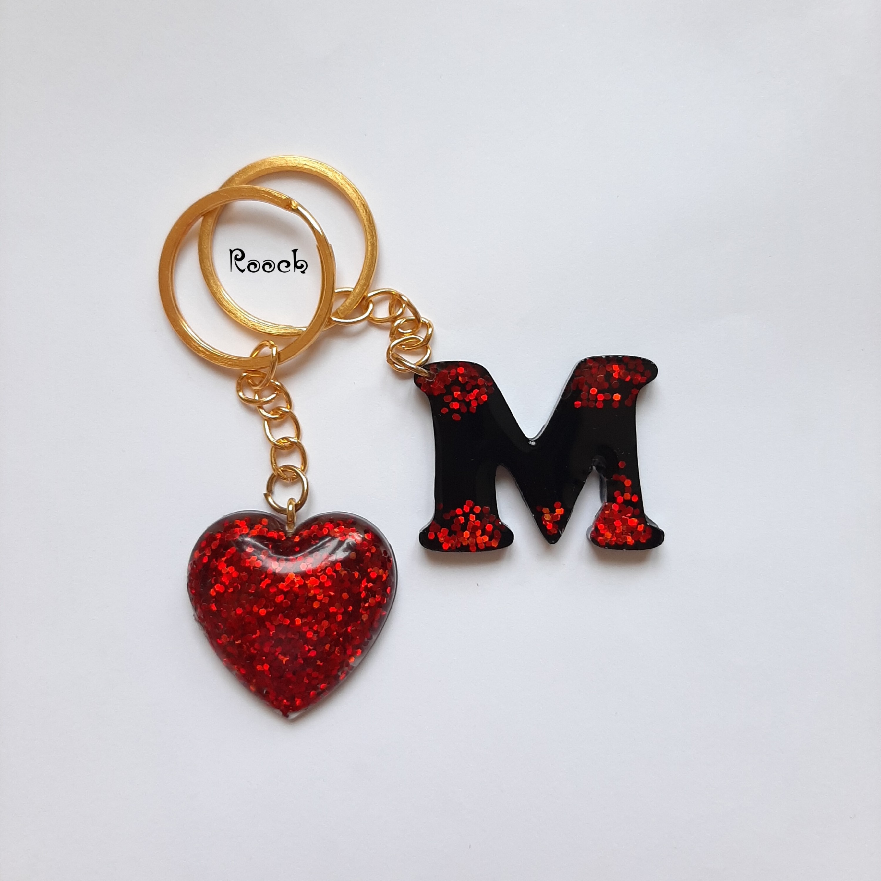 جاسوییچی و کیف و کوله و کلید فانتزی حدوف انگلیسی حرف M و قلب قابل سفارش با رنگ و طرح دلخواه شما