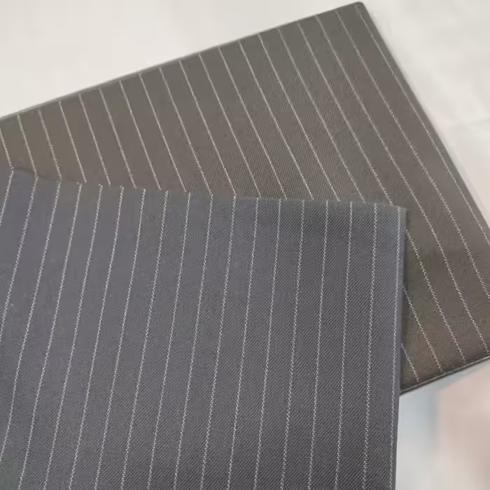 پارچه فاستونی دیپلمات کش جامعه 45 درصد پشم و 55 درصد نخ آلمان و تحت لیسانس سلکا انگلیس 