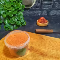 پودر گوجه فرنگی 150 گرمی در ظرف پلی پروپیلن غرفه ادویه و چاشنی برگ سبز