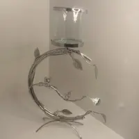 شمعدان مدل هلالی برگ پرنده نقره ای 