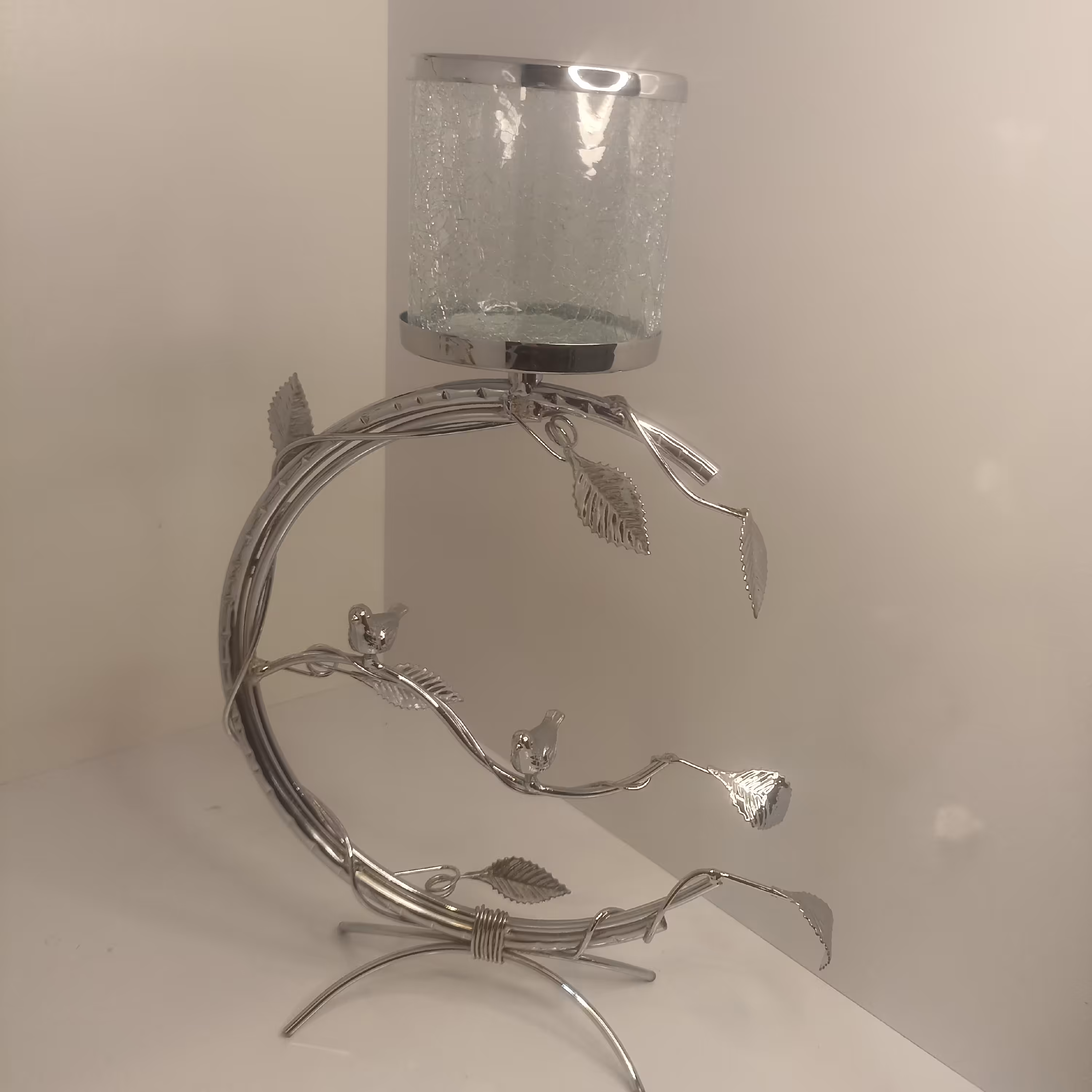 شمعدان مدل هلالی برگ پرنده نقره ای 