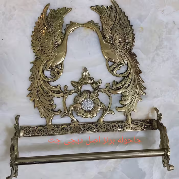 جاحوله ای طاووس برنز  اصل به وزن 975گرمی رنگ زرد خوشگل و زیبا 