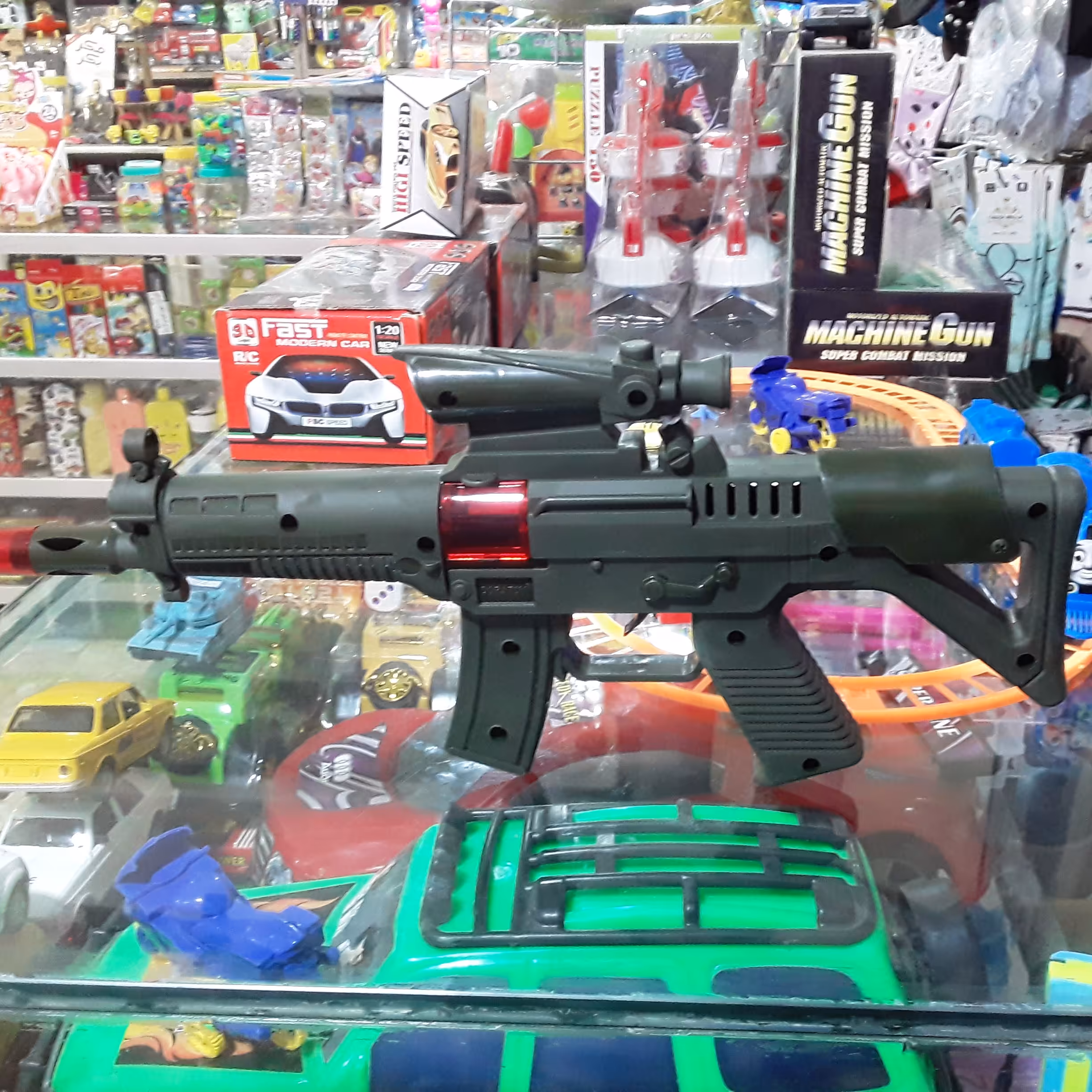 اسباب بازی تفنگ صدادار جرقه زن مدل مسلسل 