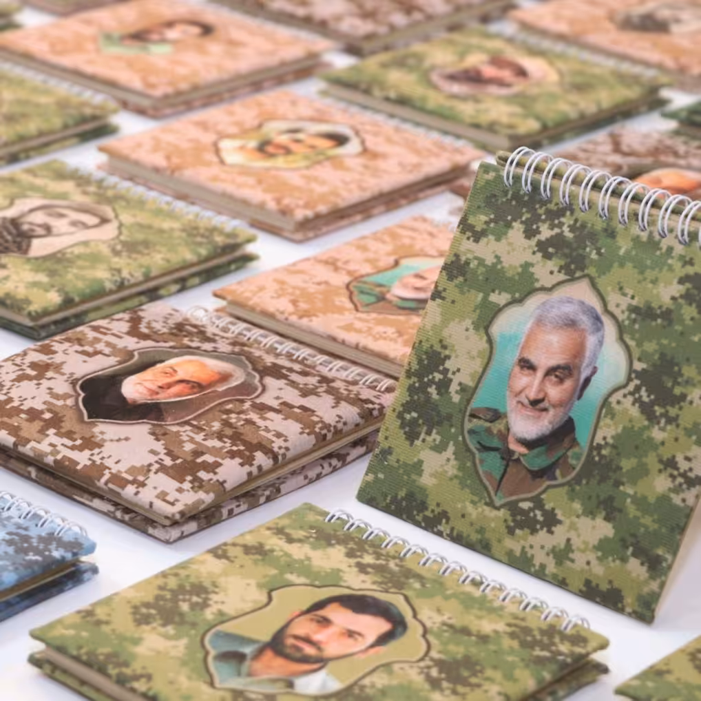 دفترچه یادداشت پارچه ای فنری کاغذ نخودی طرح شهدا پرواز بهشت 146