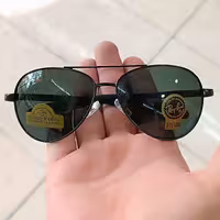 عینک آفتابی مردانه برند RAYBAN جنسیت فریم تمام قاب فلزی دسته فنر دار کیفیت عالی جنسیت عدسی شیشه uy400 کاملا استاندارد