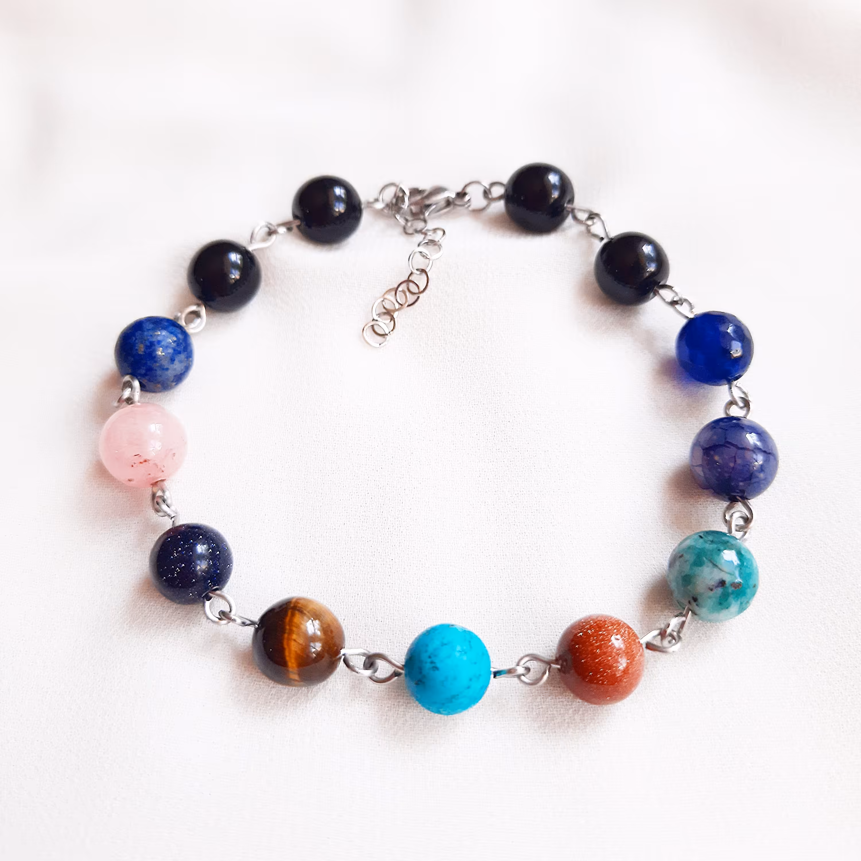 دستبند استیل فیروزه و لاجورد و دلربا و جید و عقیق شجر و جاسپر و چشم ببر و اونیکس