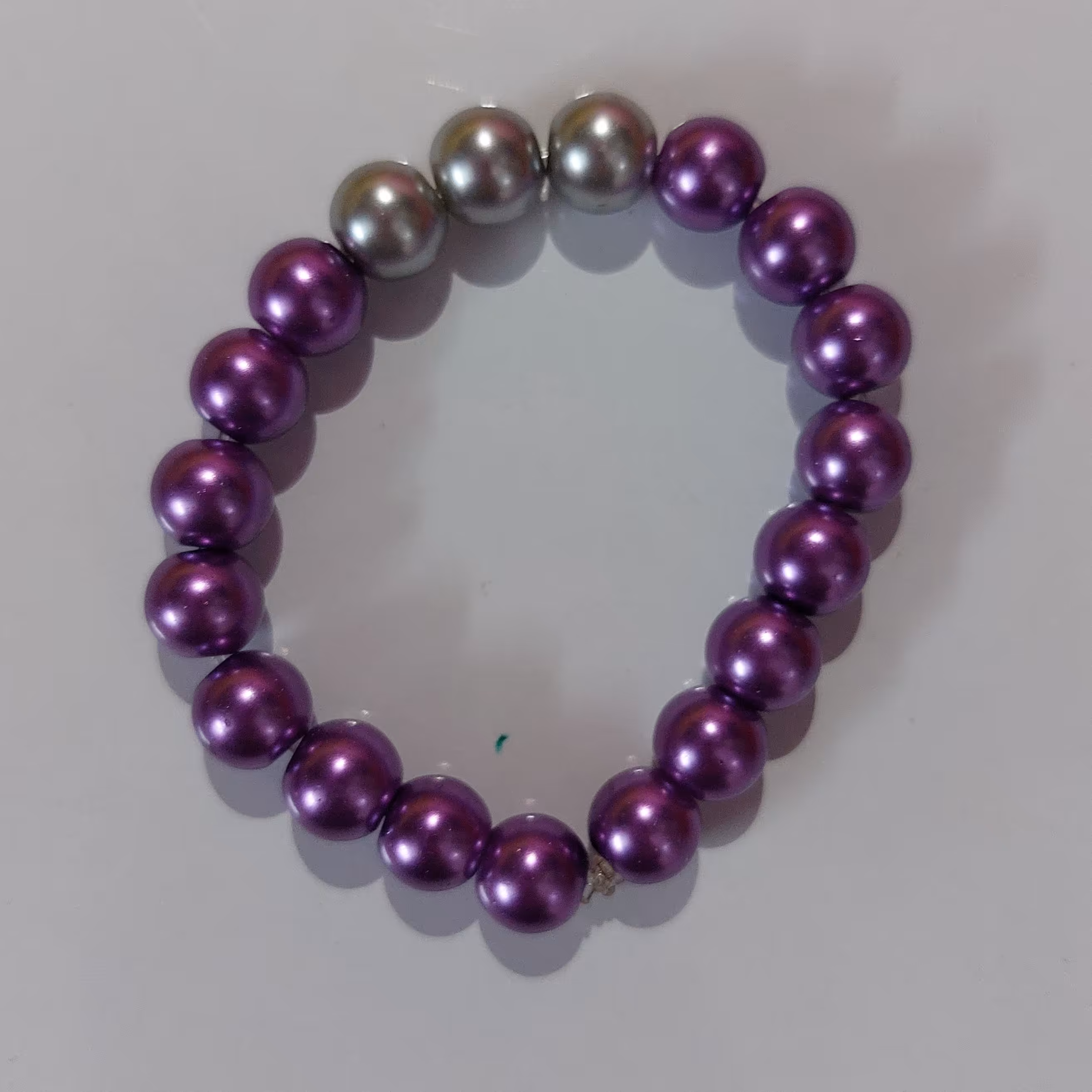 دستبند کشی بنفش و نقره ای      