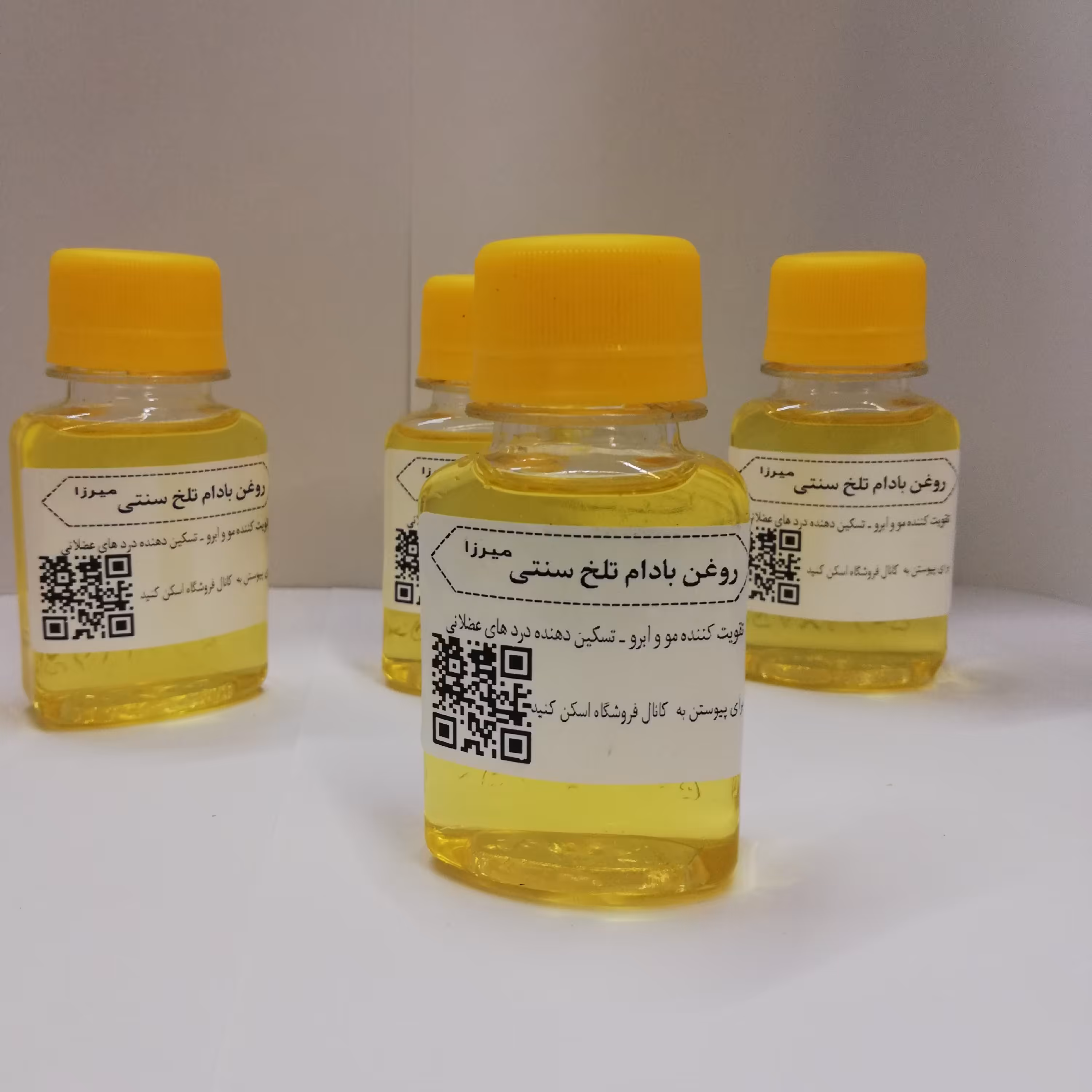 روغن بادام تلخ سنتی و خالص میرزا  (60cc) 