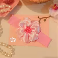 هدبند طرح گل مرواریدی