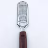 رنده کف پا هلالی دسته قهوه ای ابزار ارایشی بهداشتی