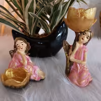  دکوری،شمعدون یا  جای وارمر طرح دختر سنگ مصنوعی