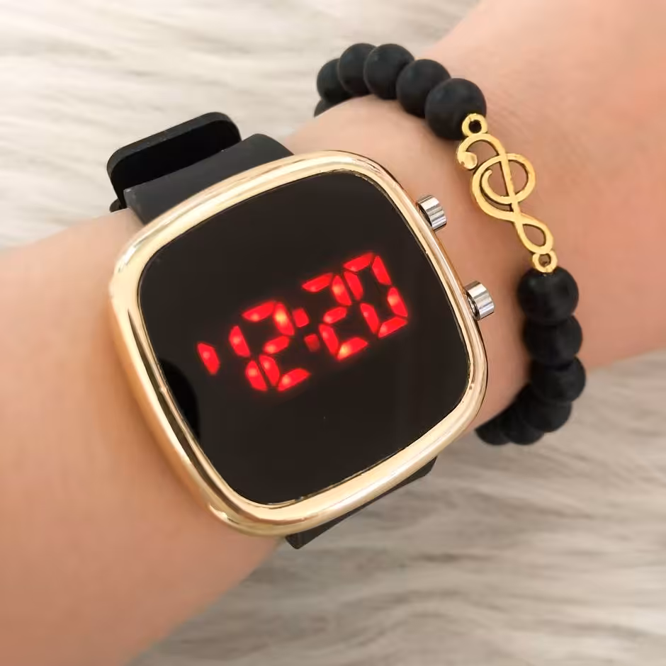 ست ساعت زنانه همراه دستبند مشکی بندژله ای ال ای دی قاب طلایی