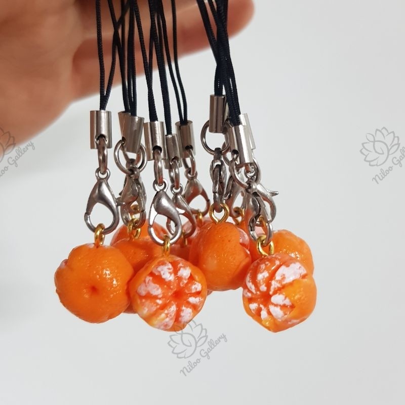 آویز موبایل نارنگی به تعداد 10عددبه همراه بندآویزمشکی