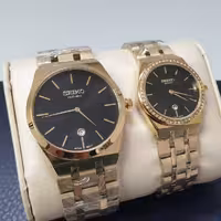 ساعت مچی ست زنانه و مردانه سیکو بند استیل رنگ‌بندی صفحه مشکی seiko 