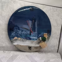 ساعت رزینی کلبه و دریا