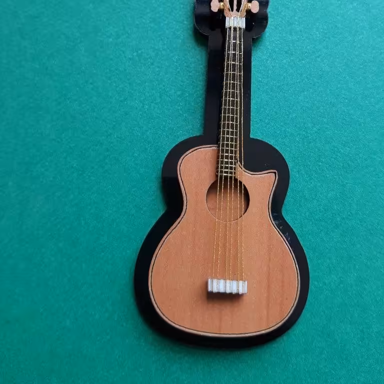 «گردن آویز گیتار آکوستیک»   🎶
در تیراژ بالا تولید می شود .💯
دکوری گیتار
ماکت گیتار
 گردن اویز گیتار
گردنبند گردن بند گیتار
ساز گیتار
گیتار تزئینی تزیینی 
گیتار مینیاتوری
محصولات کادویی فانتزی هدیه گیتار چوبی
صنایع دستی دست ساز سنتی هنری