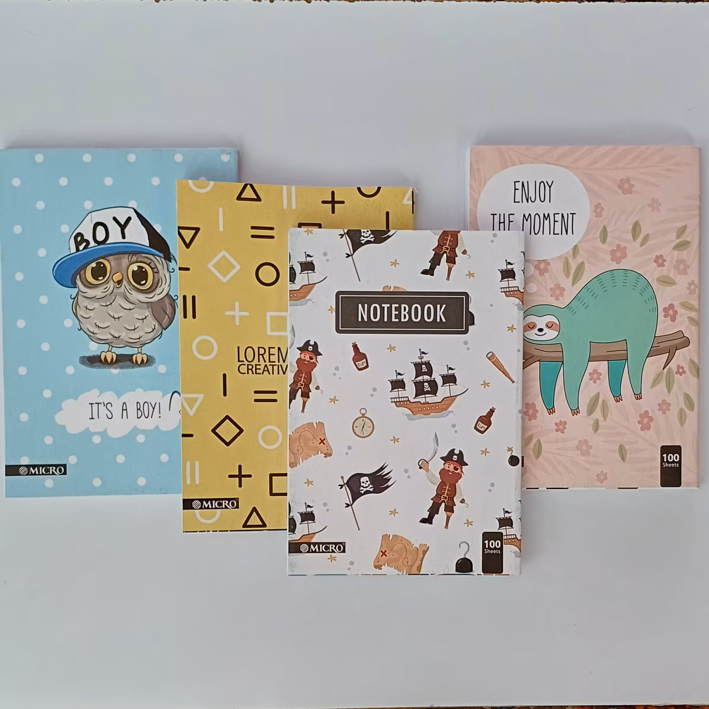 دفتر صدبرگ منگنه ای در طرحهای فانتزی زیبا و باکیفیت برگه 70 گرم خطوط پررنگ 