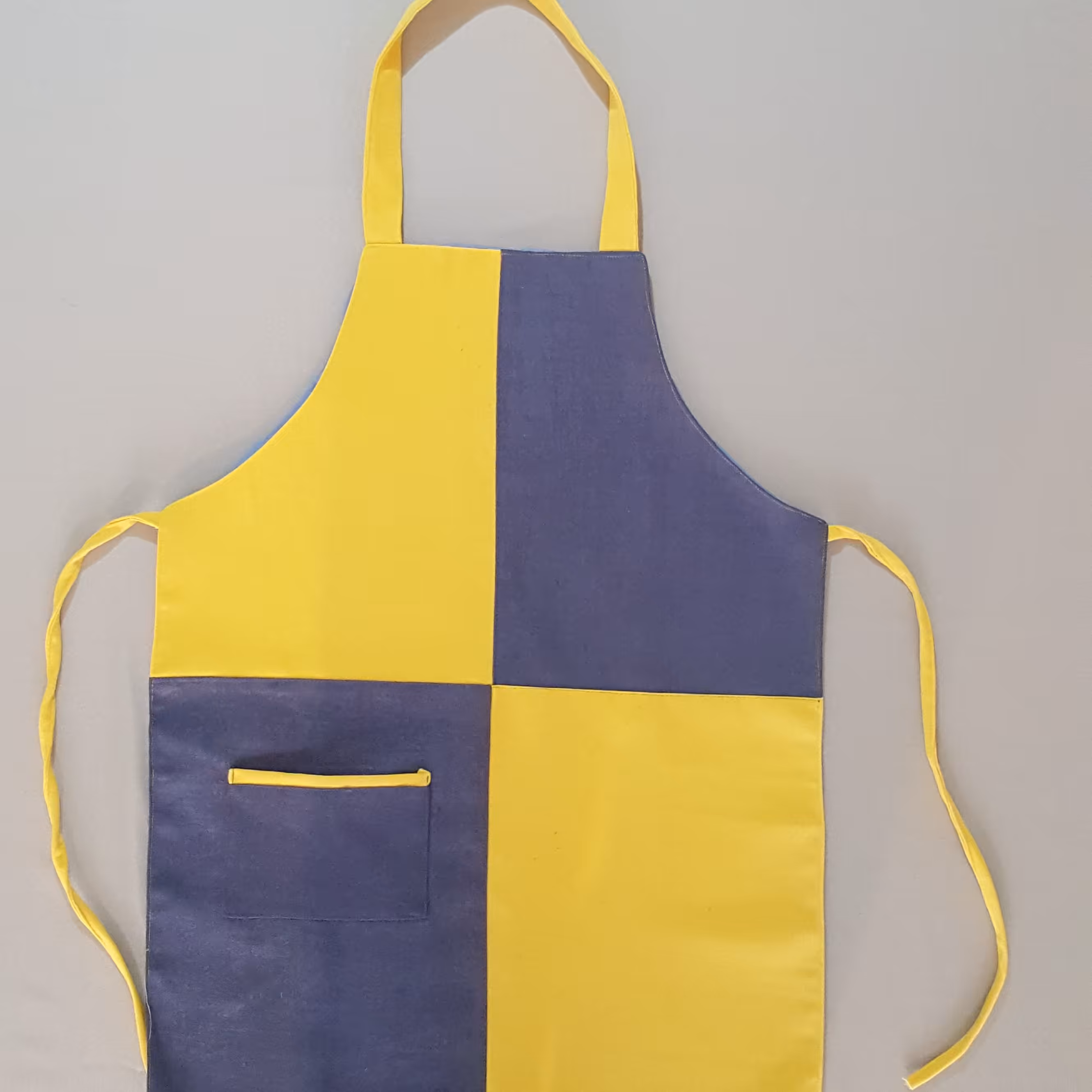 پیشبند آشپزخانه ساده طرح زرد و آبی با جنس کتان ضخیم