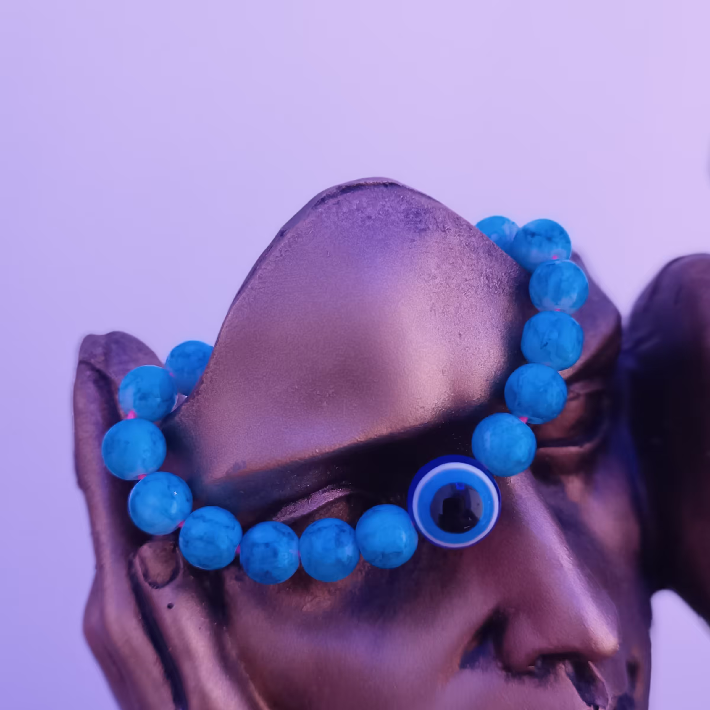 دستبند چشم نظر که به هر سایزی که می خواین می تونید ببندید و با مروارید های آبی شفاف