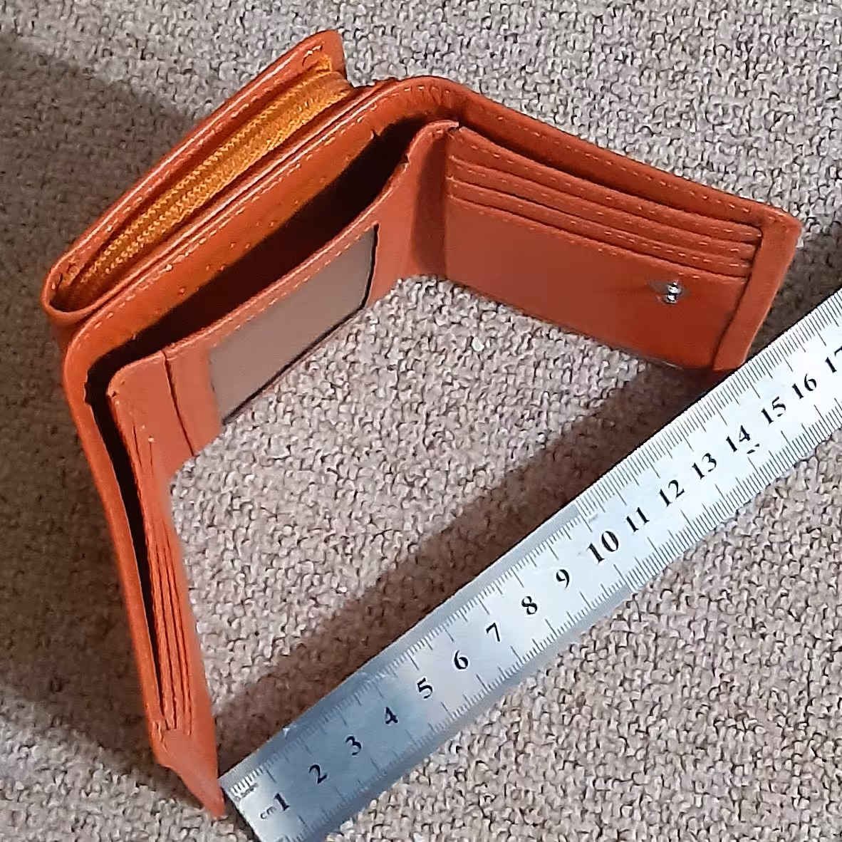 کیف پول چرم طبیعی نارنجی جادارمناسب برای اسکناس وکارت وعابروسکه سیم کارت...