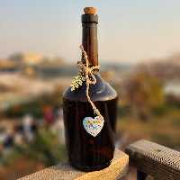 بطری یک لیتری دنیز شیشه قهو ه ای  دست ساز با درب چوب پنبه  وارداتی