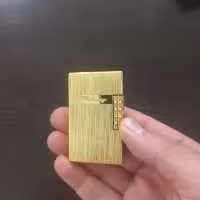 فندک گازی روکش طلا با جعبه اصلی و شناسنامه  بهمراه حک اسم