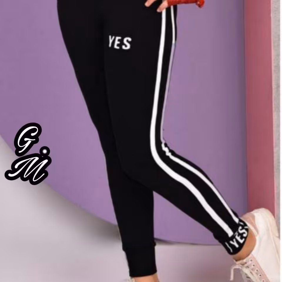 شلوار لاکرا مشکی بغل نوار YESدخترانه سایز 70