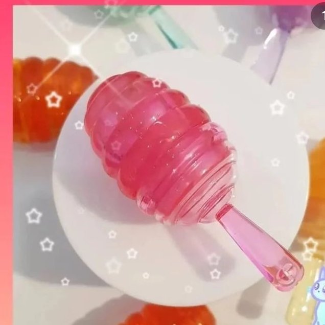 برق لب طرح ظرف عسل برای نرم شدن لبها و خوشرنگ و براق شدن آنها