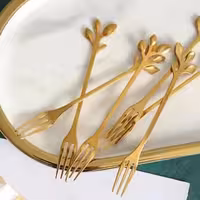 چنگال کوچک استیل طلایی مدل برگی 