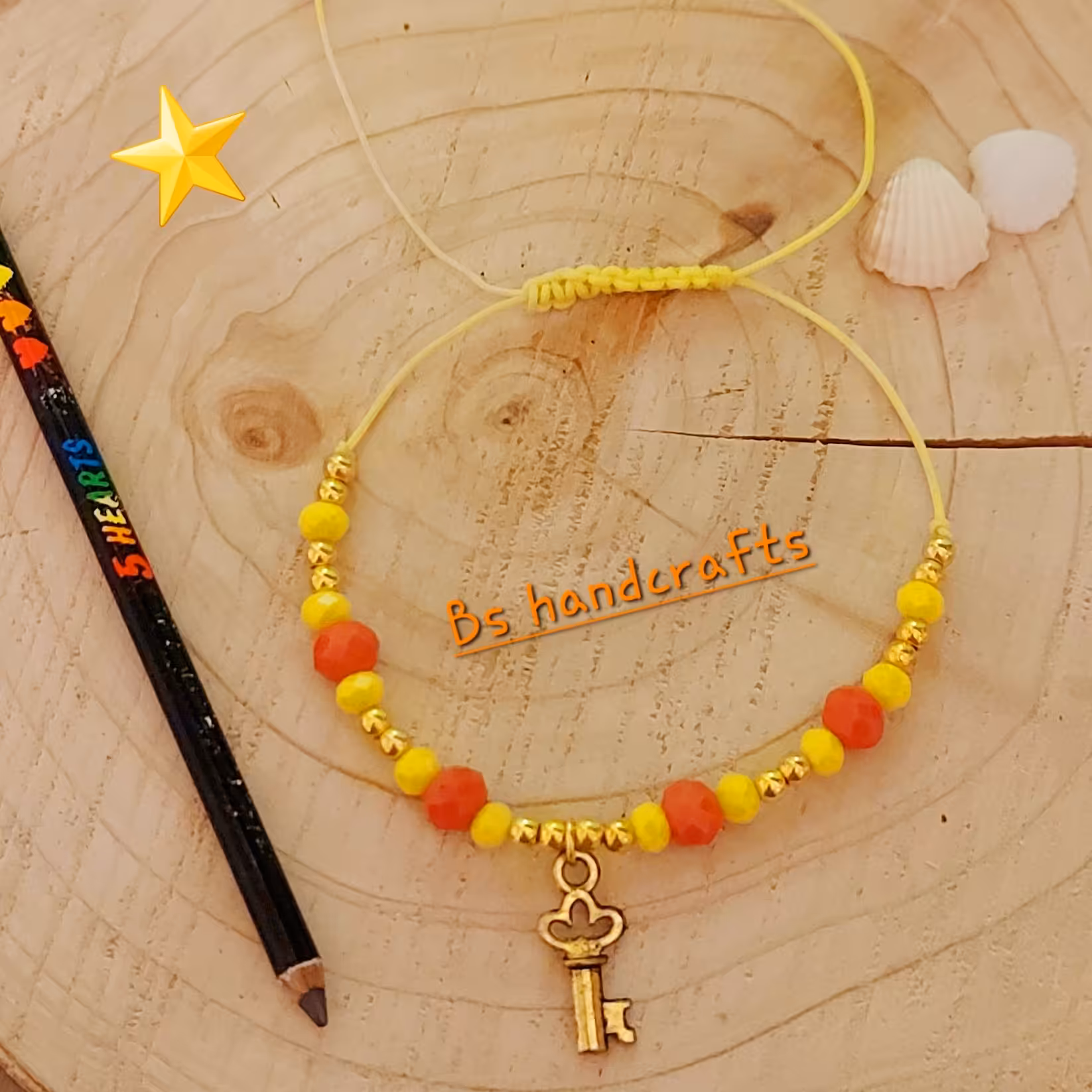 کلید - دستبند سنگ کریستال با آویز زرد قلم بند قابل تنظیم