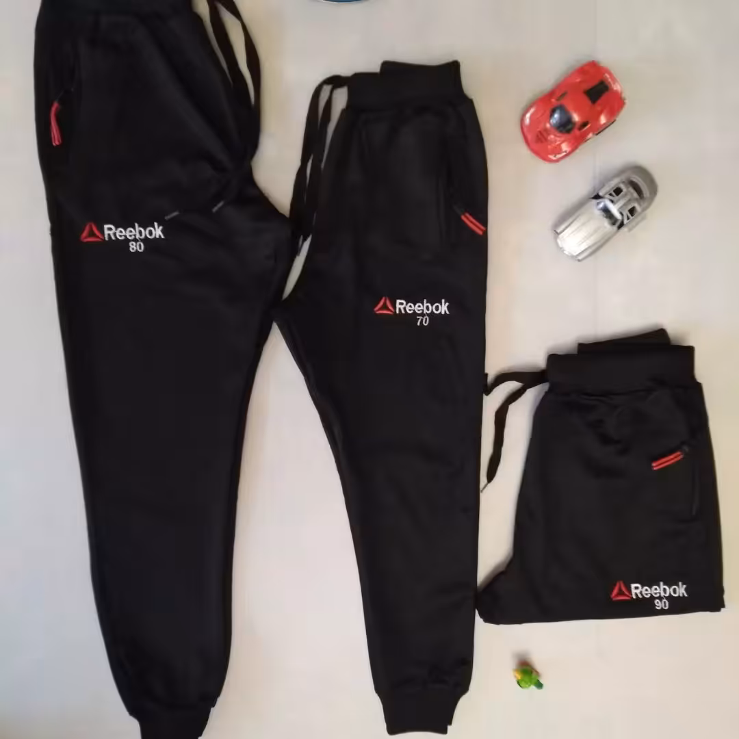 شلوار اسلش پسرانه،تک رنگ مشکی، قد 70،جنس نخ و پلاستیک، دم پا مچی