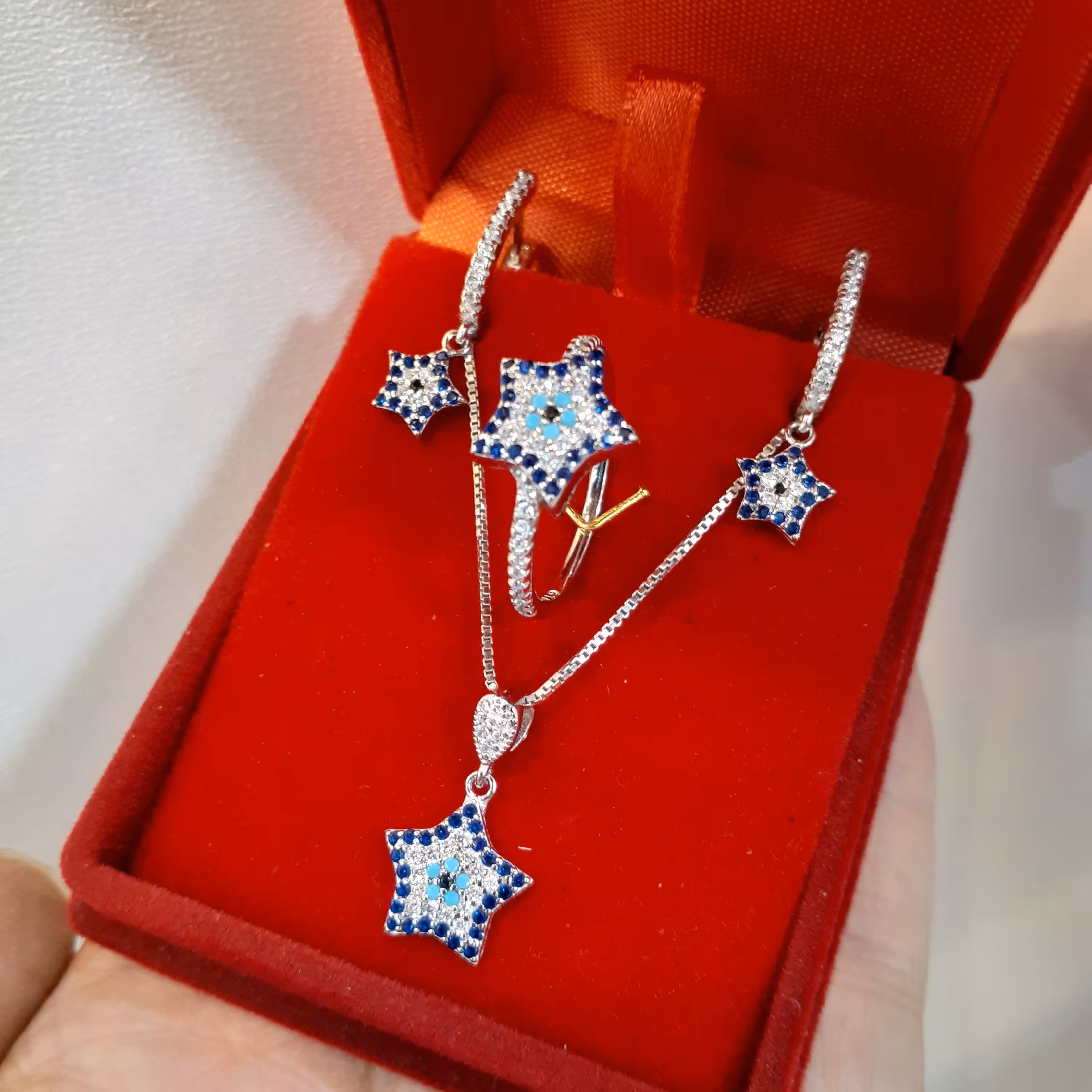 نیمست نقره چشم نظر ستاره ای  بسیار شیک با گوشواره کلیپسی راحت و محکم و زنجیر ونیزی ضخامت متوسط به طول 45 سانتیمتر