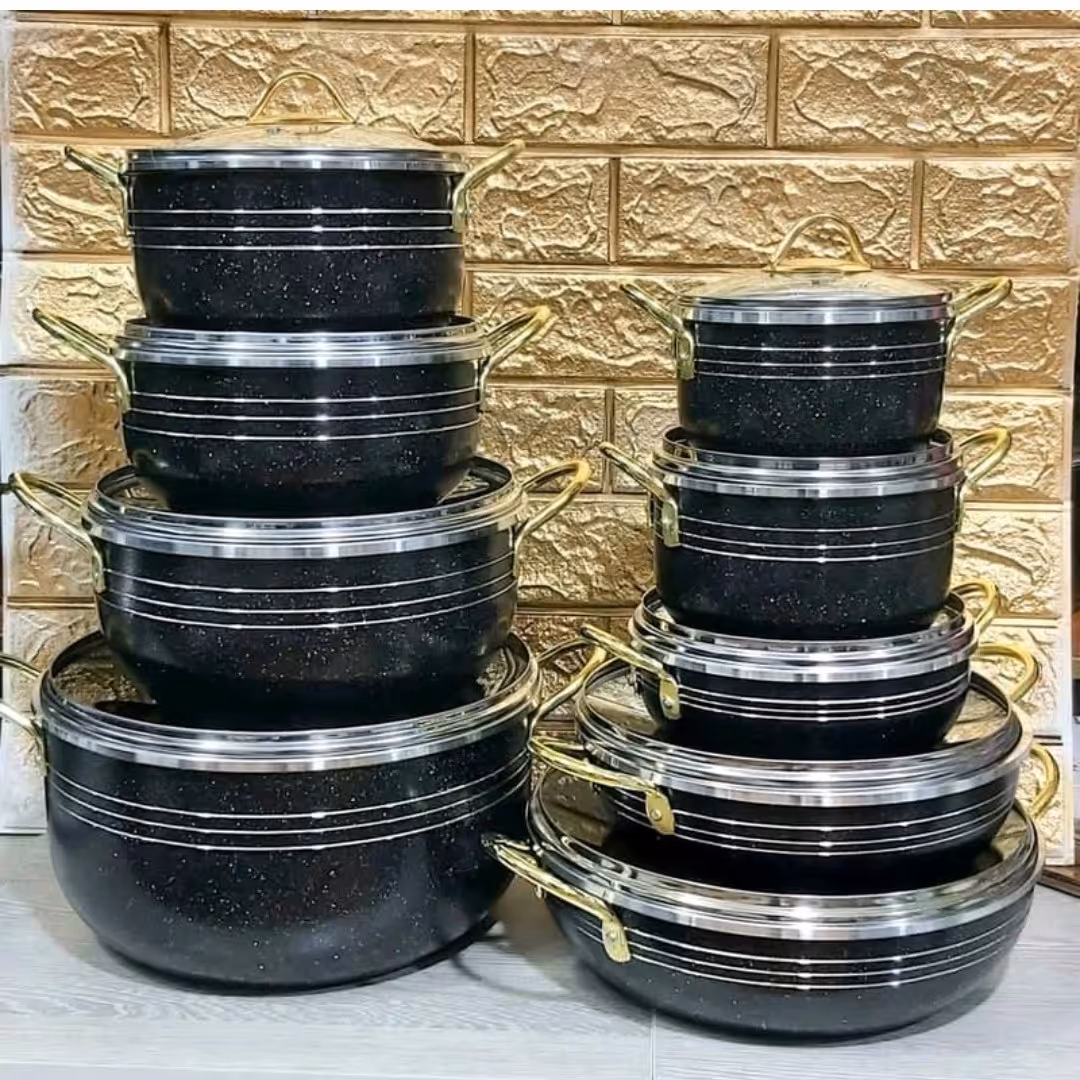 سرویس قابلمه 14 پارچه کوشا دسته طلایی همراه با ضمانت نامه یکساله داخل سرویس 