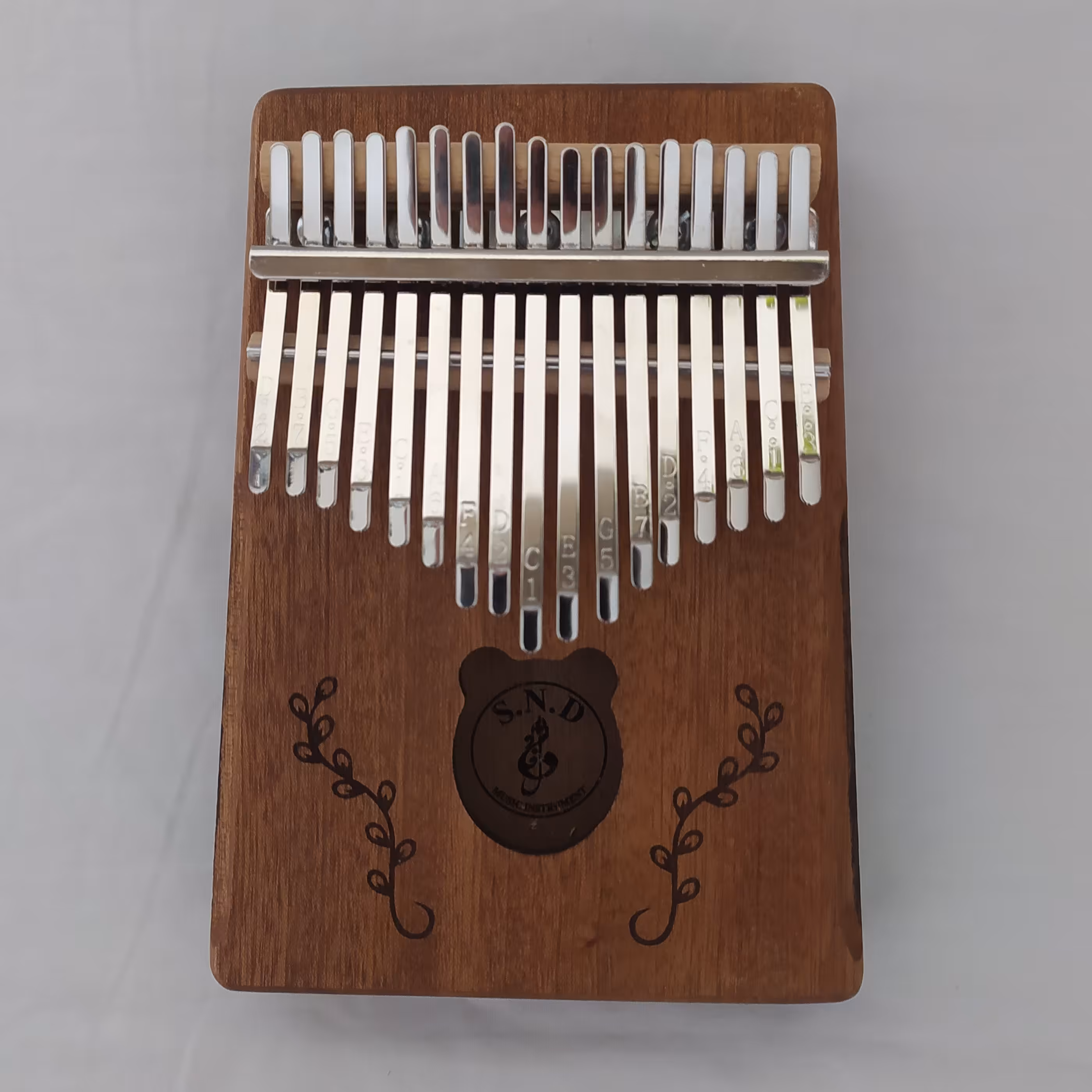 کالیمبا SND  هفده تیغه اصلی طرح خرس چوب ماهگونی