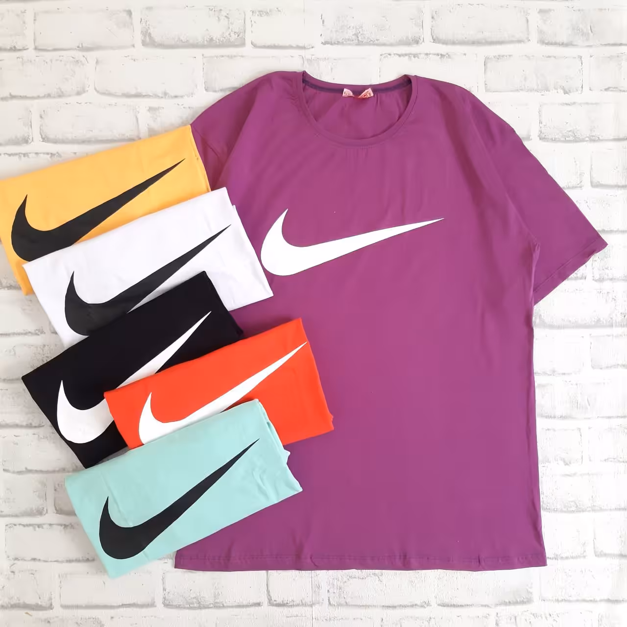 تیشرت لانگ دخترانه و پسرانه از چهارده سال تا بزرگسال طرح نایک کد 623n