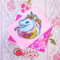 دفترپولیشی . دفتر پولکی فانتزی . د. دفتر فانتزی تکشاخ. تک شاخ . یونیکورن. لوازم تحریر فانتزی 