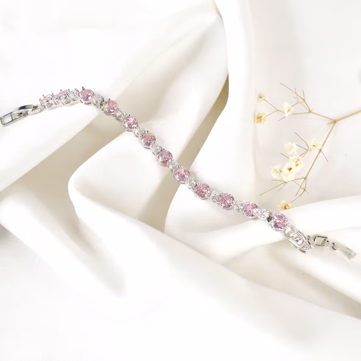 دستبند نگین سوارسکی صورتی کد 9436