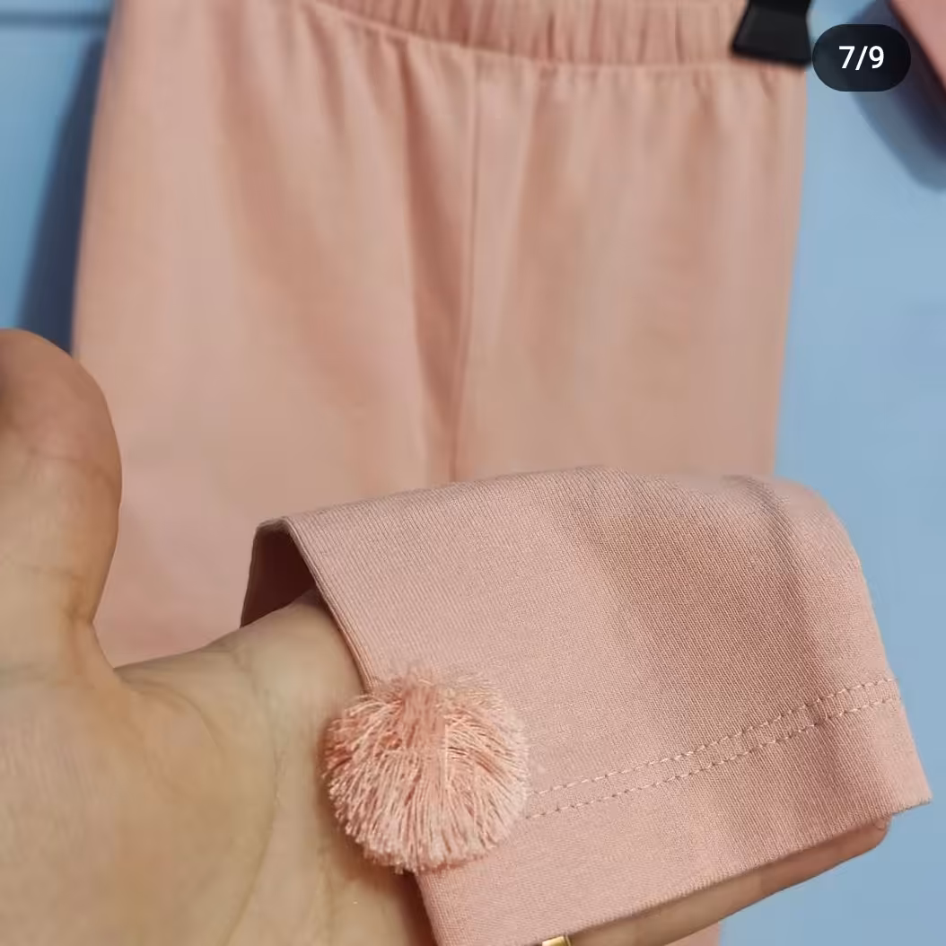 شلوار صورتی پوم پومی سایز 2-3