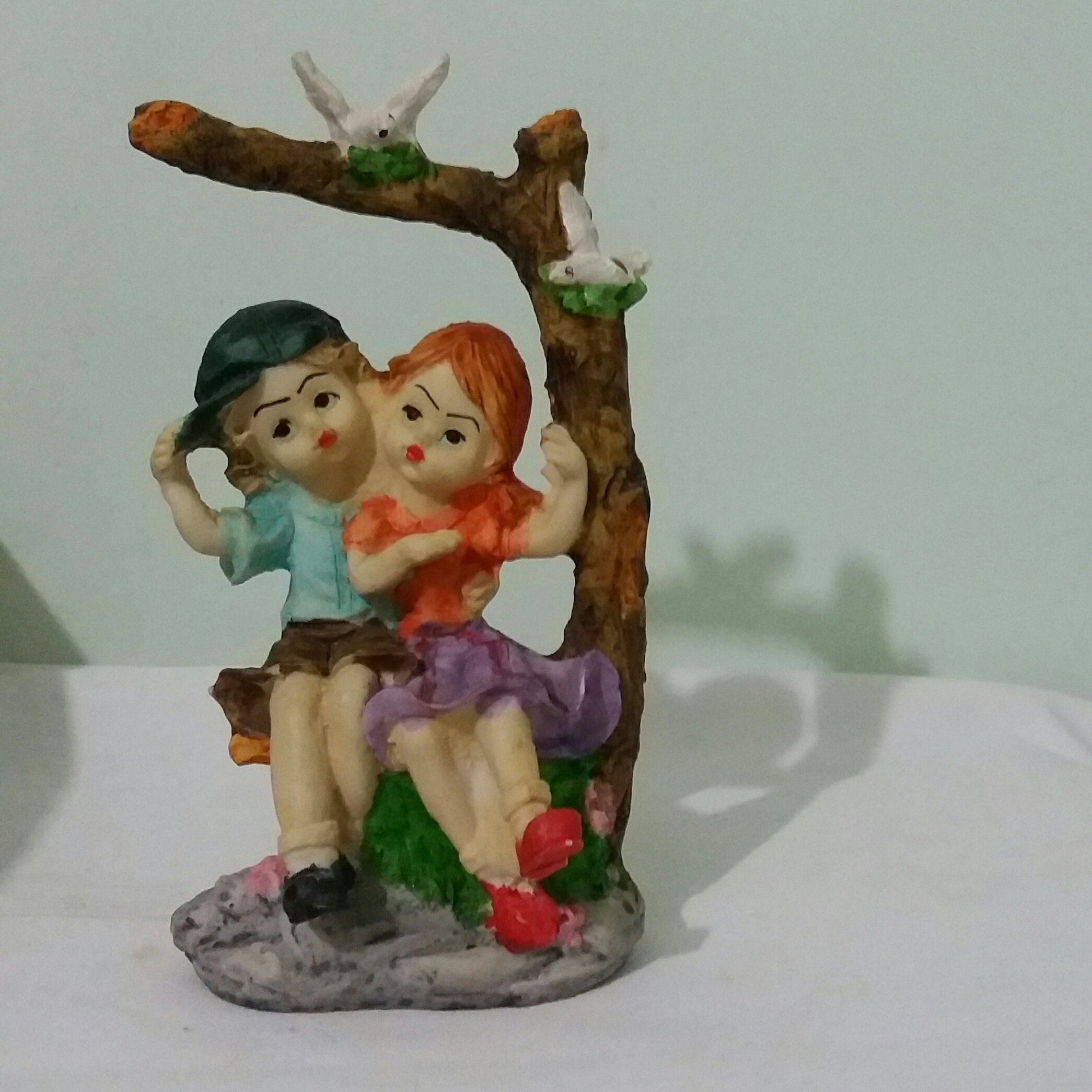 مجسمه دخترپسردرخت