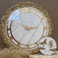 ساعت دیواری رزینی سفید طلایی دور ورق طلا کار شده در سایز  45سانت بااین قیمته