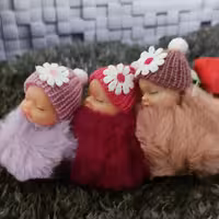 جاسویچی  عروسکی بی بی پولیشی گل سر دار