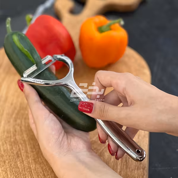 پوست کن مدل کمانی استیل شنیا